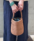 ANMDS2501 RAFFIA ONE HANDLE BARREL BAG